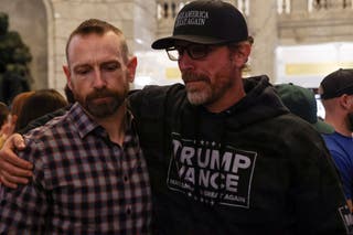 Mourners attend a vigil in Salt Lake City